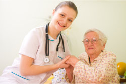 nurse taking care of an elder